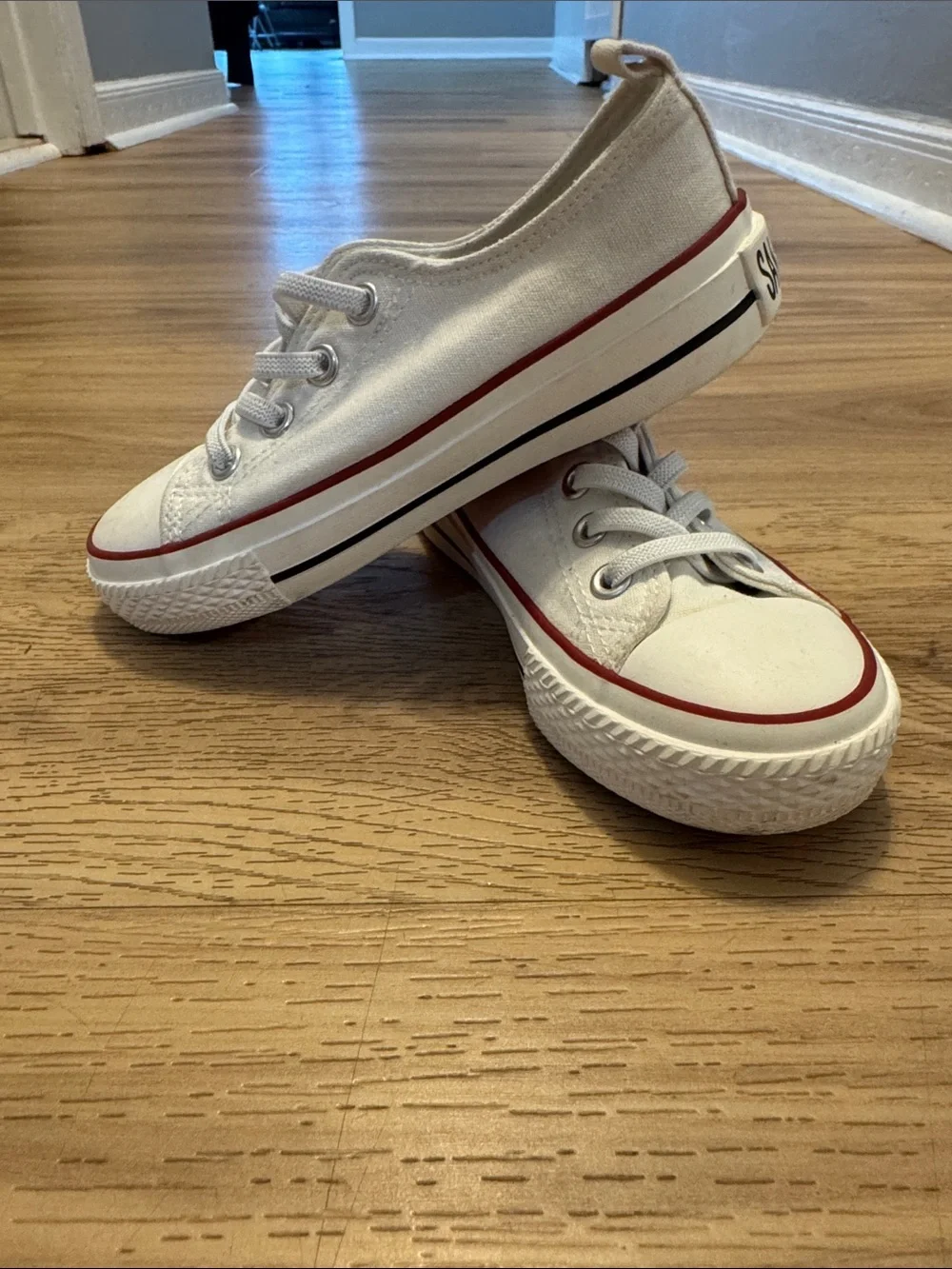 Skechers White Kids Sneakers with Red Stripe